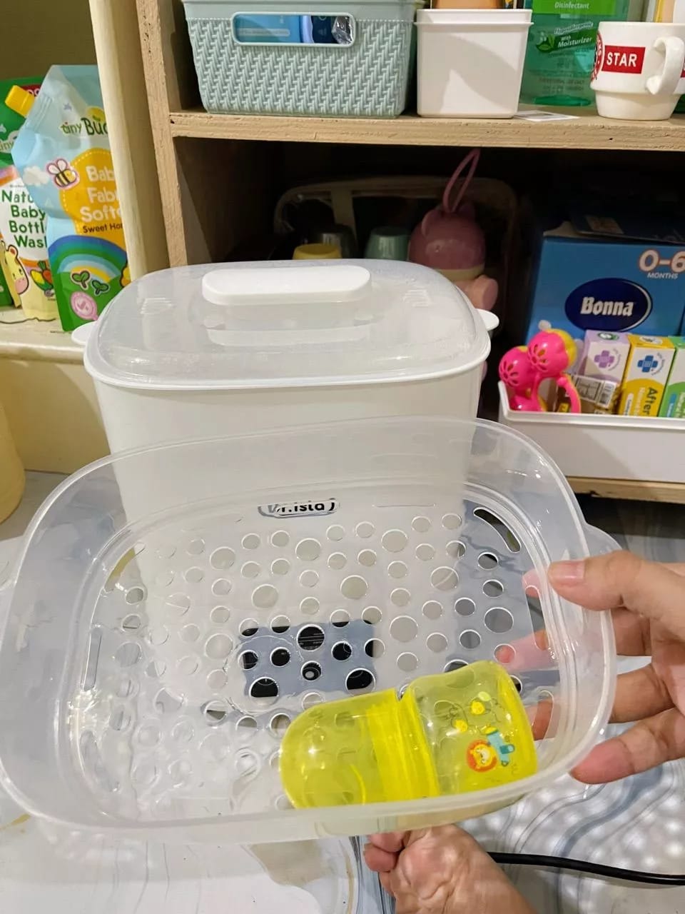 Customer photo review of 5 in 1 Baby Bottle Sterilizer With Drying Bottle Heater Capacity Auto Shut-Off