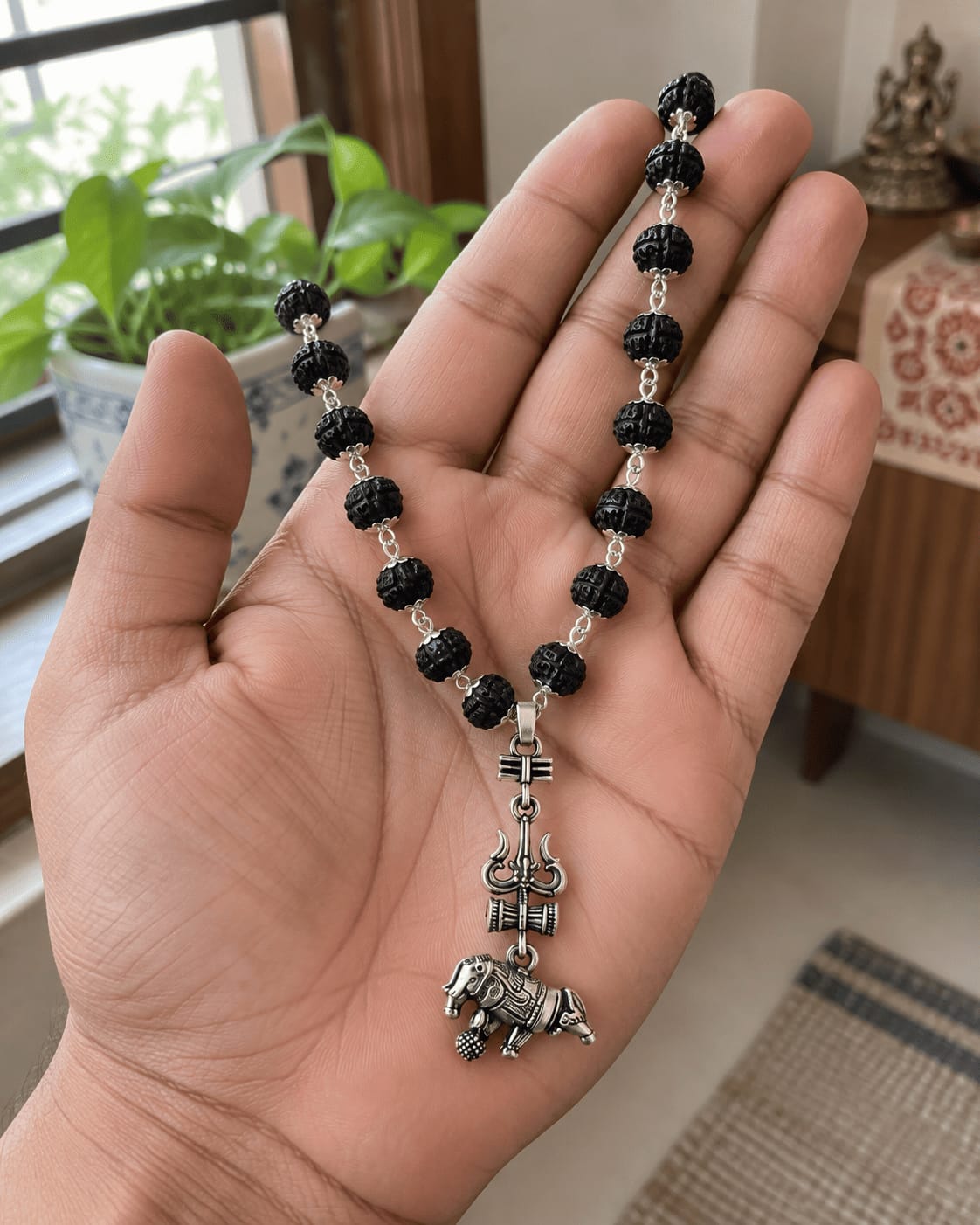 Customer photo review of Original Silver-Plated Karungali Mala with Shiv Trishul Nandi Pendant