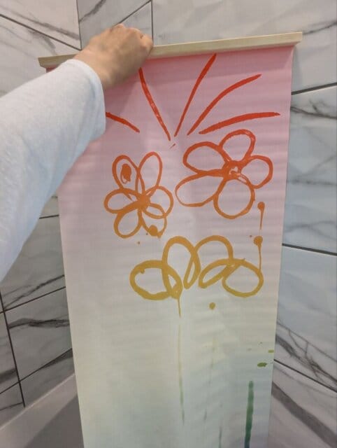 Customer photo review of Magic Drew Colorful Reusable Water Writing Cloth [FREE Water Cup + Brush]