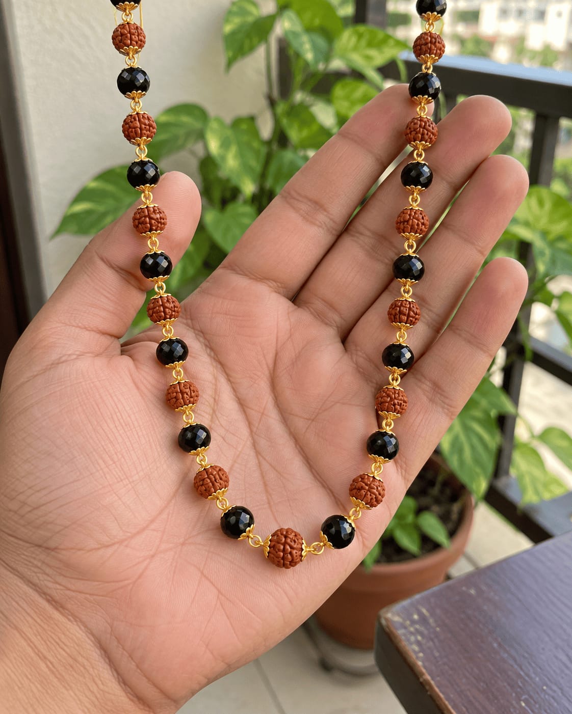 Customer photo review of Gold Plated Karungali & Rudraksha Premium Mala