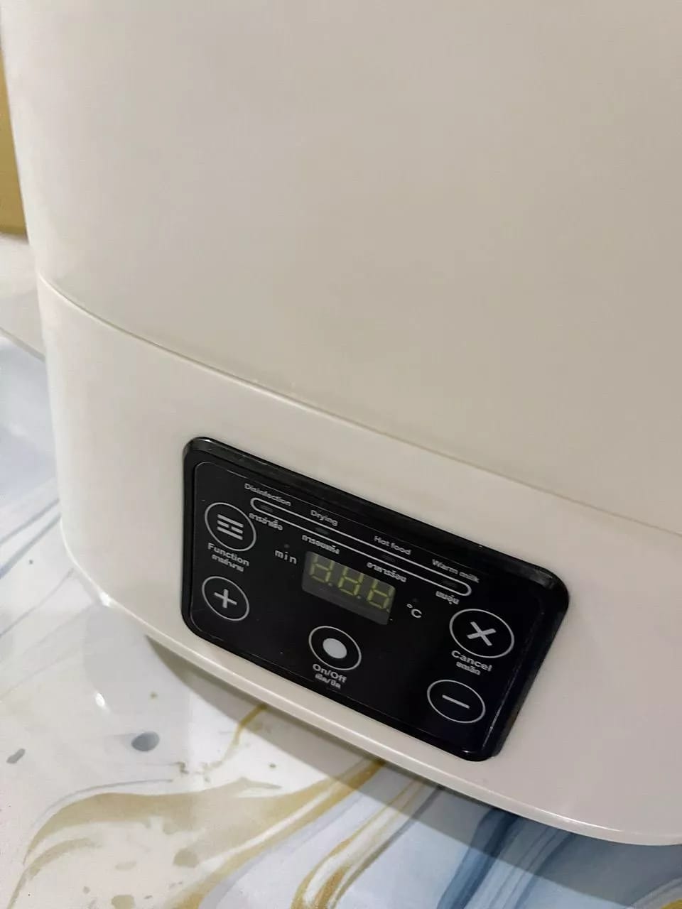 Customer photo review of 5 in 1 Baby Bottle Sterilizer With Drying Bottle Heater Capacity Auto Shut-Off