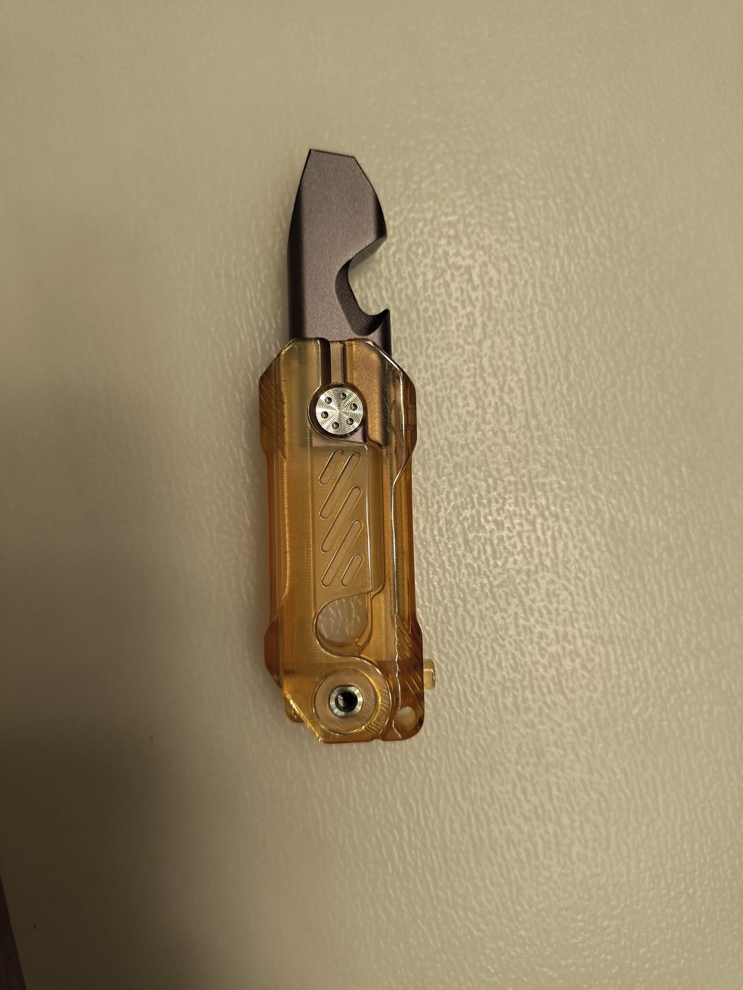 Customer photo review of Fegve TORTOISE Slide Open Gravity Fidget Prybar