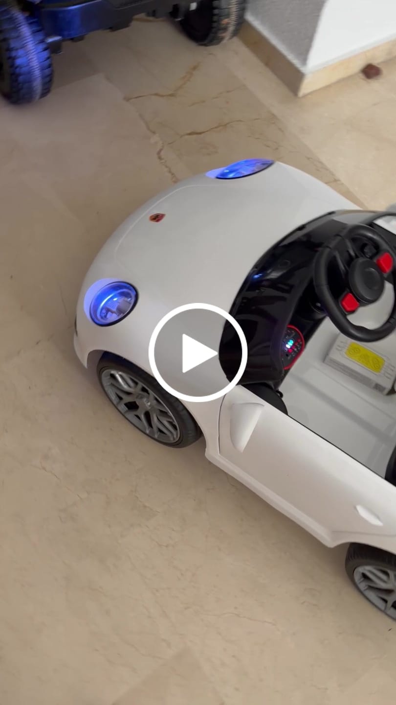 Customer video review of Carro Elétrico para Criança 911 Style Branco 12v c/ RODAS DE BORRACHA & ASSENTO EM PELE