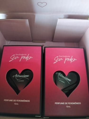 Customer's two Perfume Attracione Sensual boxes with heart-shaped cutouts in the center.