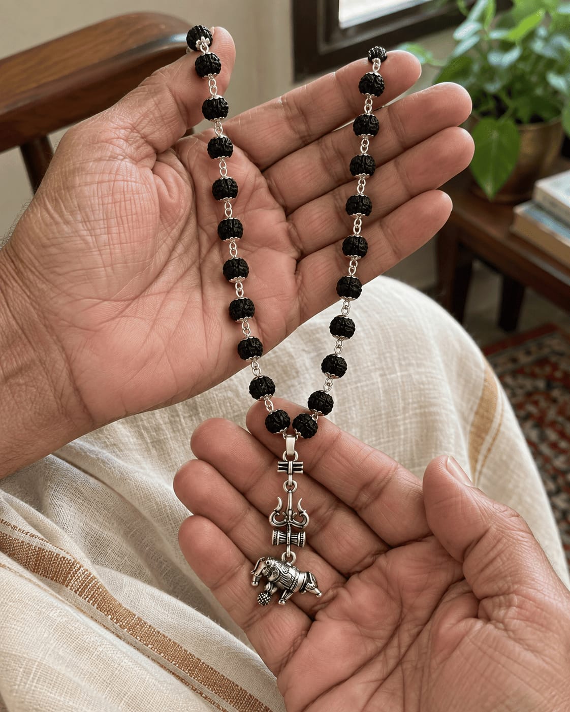 Customer photo review of Original Silver-Plated Karungali Mala with Shiv Trishul Nandi Pendant