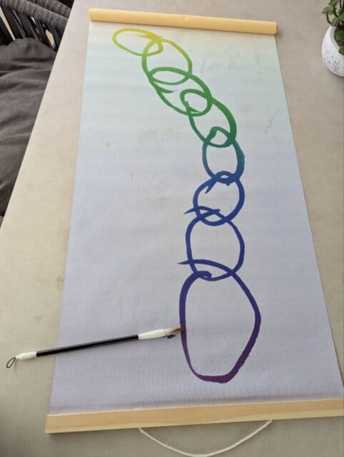 Customer photo review of Magic Drew Colorful Reusable Water Writing Cloth [FREE Water Cup + Brush]