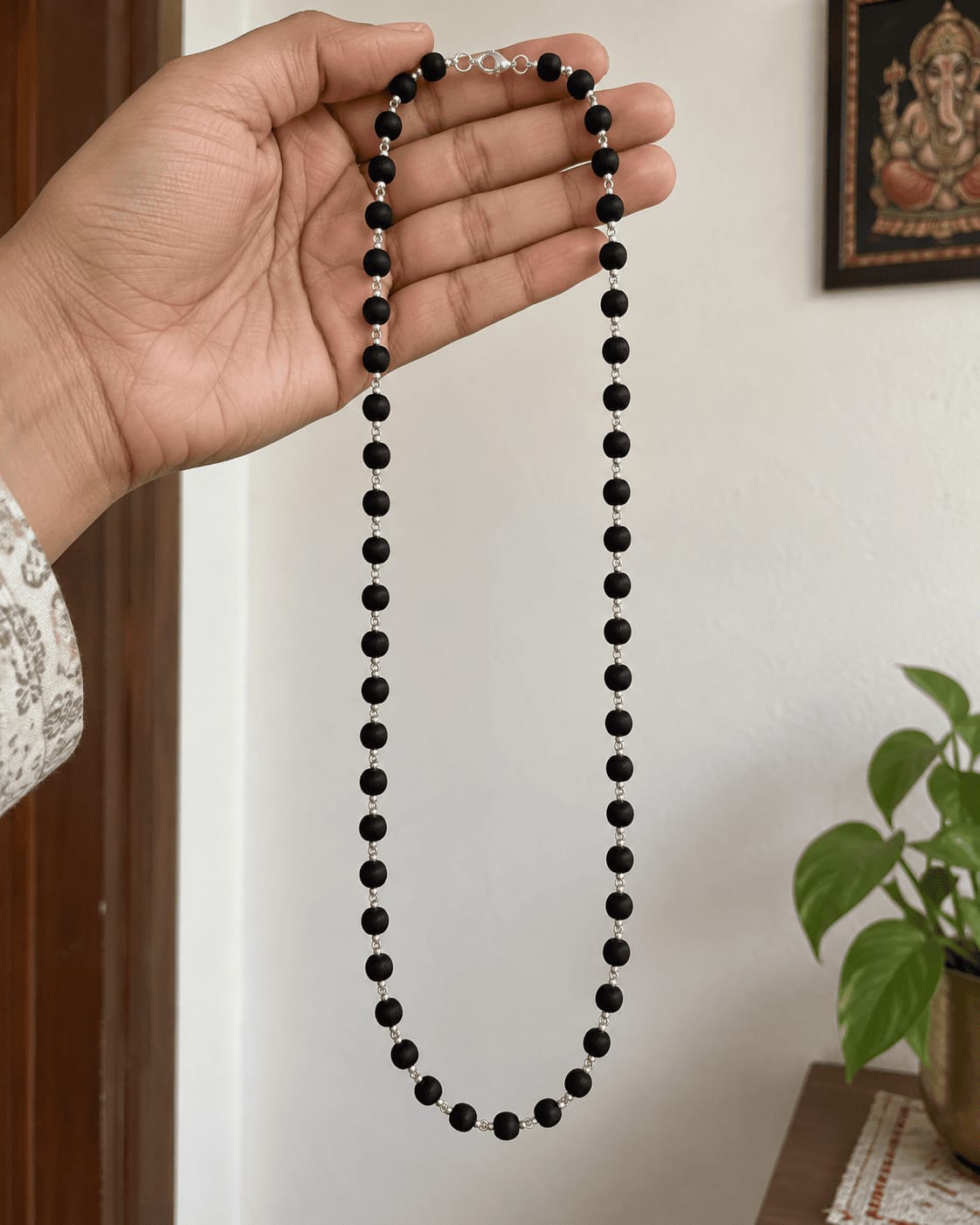 Customer photo review of Karungali Mala with Silver-Plated Chain