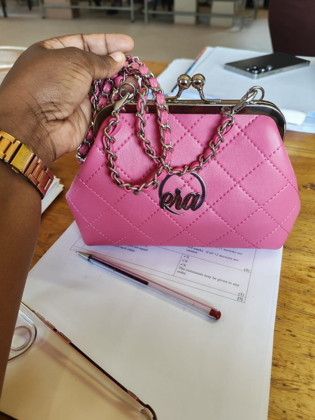 Customer photo review of ERA Mini Kisslock Chain Bag – Pink