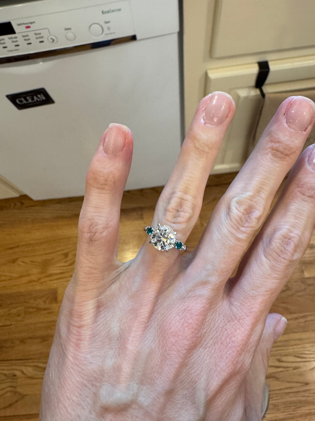 Customer photo review of Nature Bamboo Inspired Round Moissanite with Emerald Engagement Ring
