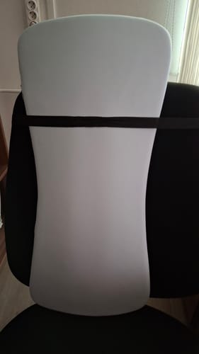 Customer's LumbiFit memory foam lumbar support pillow attached to a black office chair.