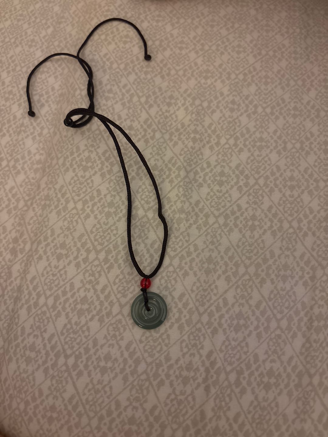 Customer photo review of Buddha Stones Green Jade Double Peace Buckle Abundance Necklace Pendant
