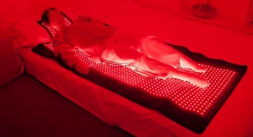 Customer photo review of LUMYHEALTH Dual-Pulse Red Light Therapy Mat for Pain Relief