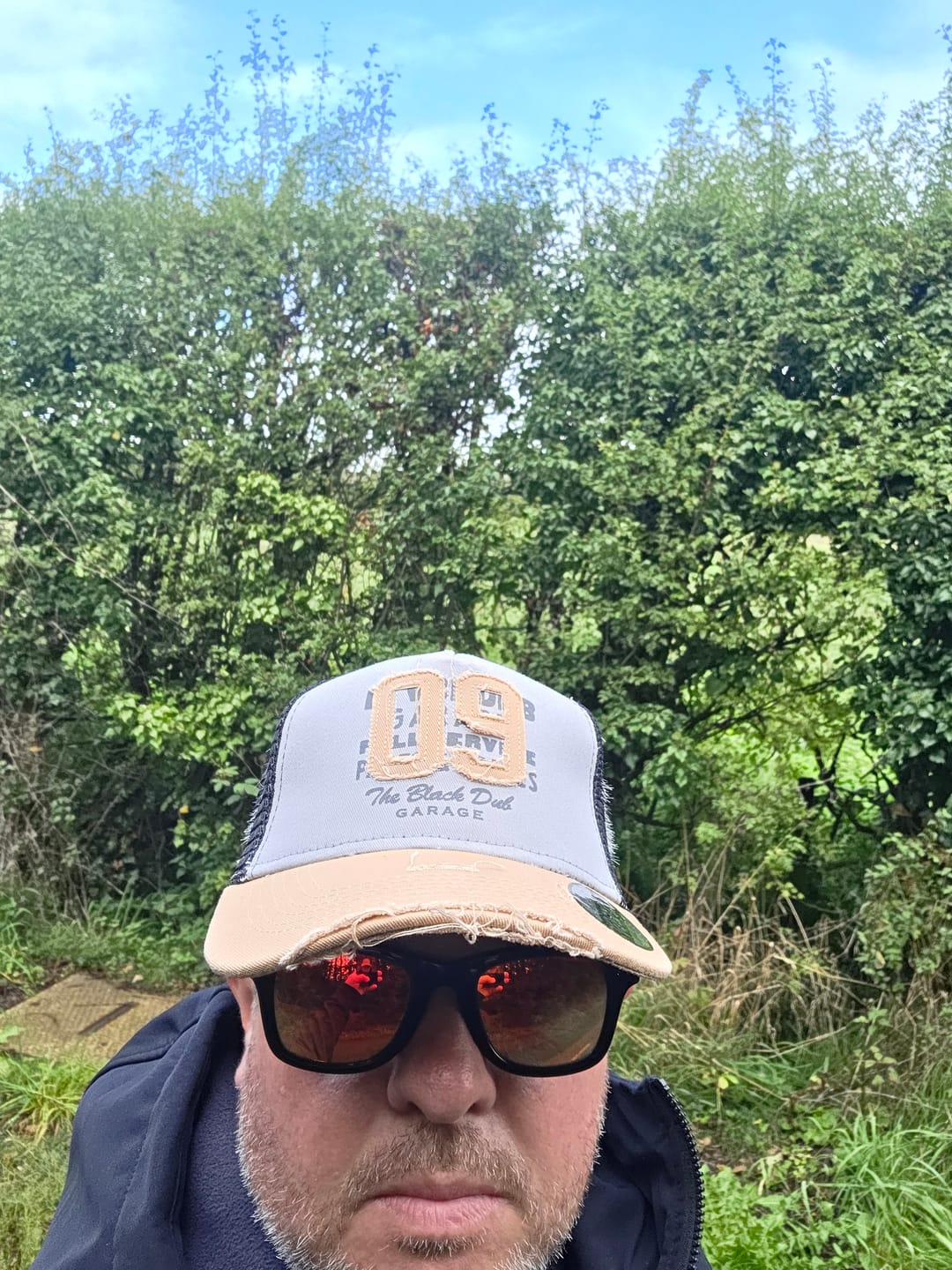 Customer photo review of Stone Parts & Spares '09' Trucker Hat