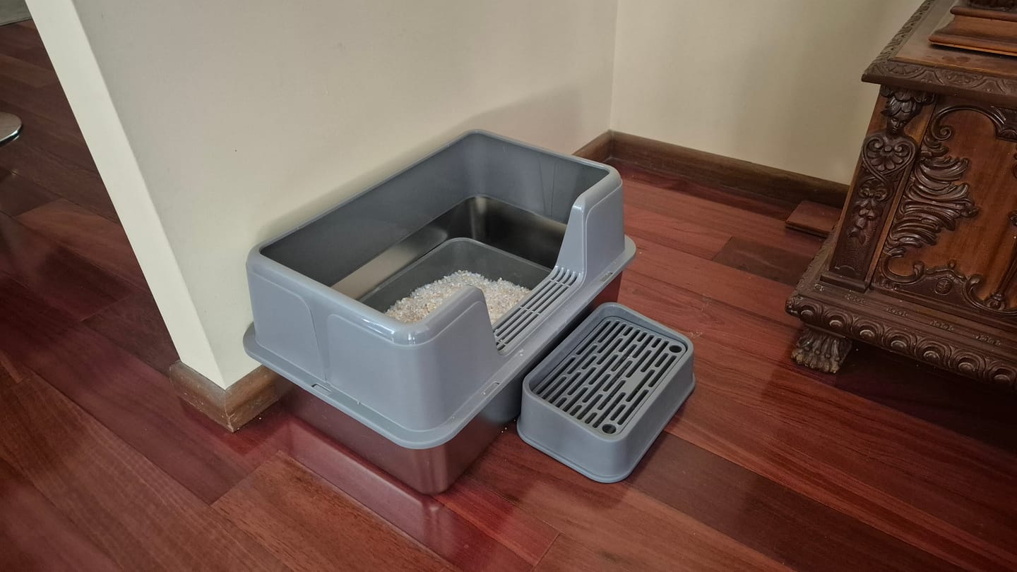 Customer photo review of Stainless Steel Cat Litter Box Large Semi-Enclosed Easy Cleaning Pet Toilet