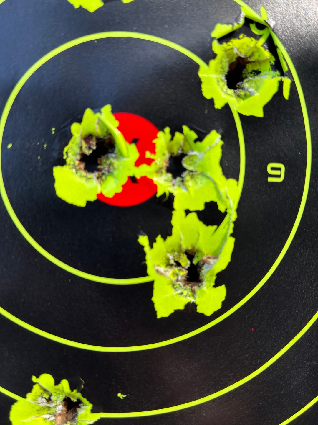 Customer photo review of 8” Stick Splatter Adhesive Bullseye Bright Fluorescent Yellow Shooting Targets  - 50 Pack