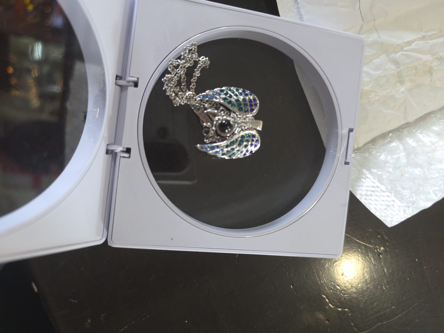 Customer photo review of Guardian Angel Photo Projection Necklace
