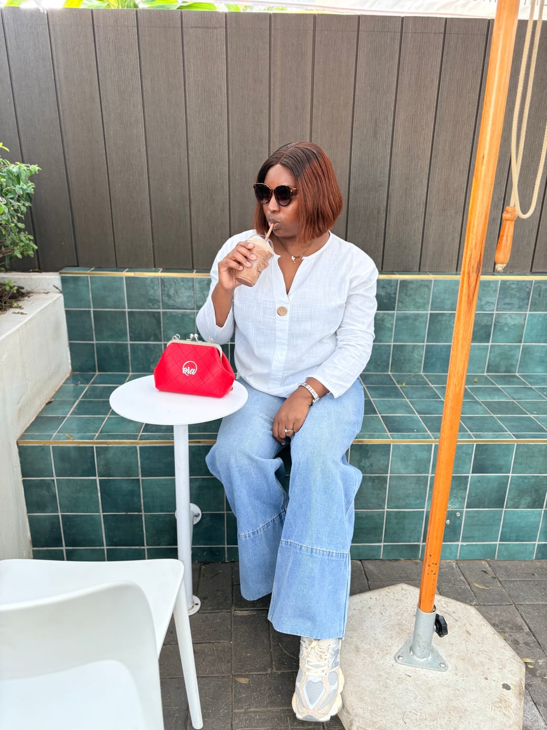 Customer photo review of ERA Mini Kisslock Chain Bag – Red