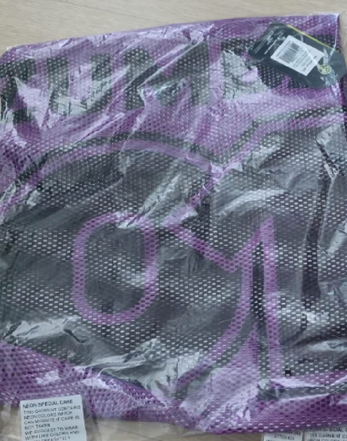 Customer photo review of Ultrabright Oversized Mesh V-Neck Top