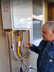 Customer photo review of Camplux Whole Home Outdoor Tankless Hot Water Heater 6.86 GPM for 3-4 Persons Whole House | White