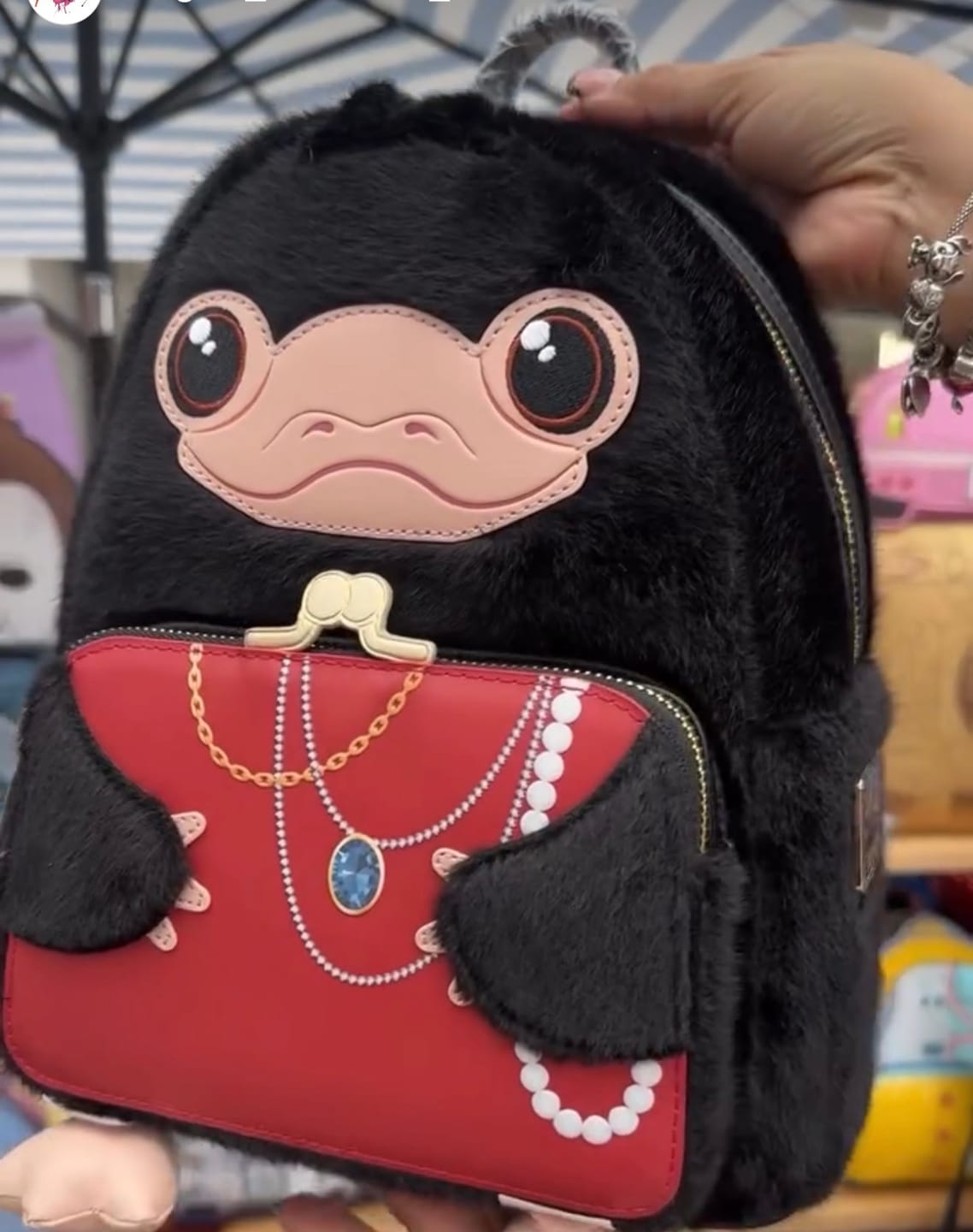 Customer photo review of Loungefly Fantastic Beasts Niffler Plush Cosplay Mini Backpack