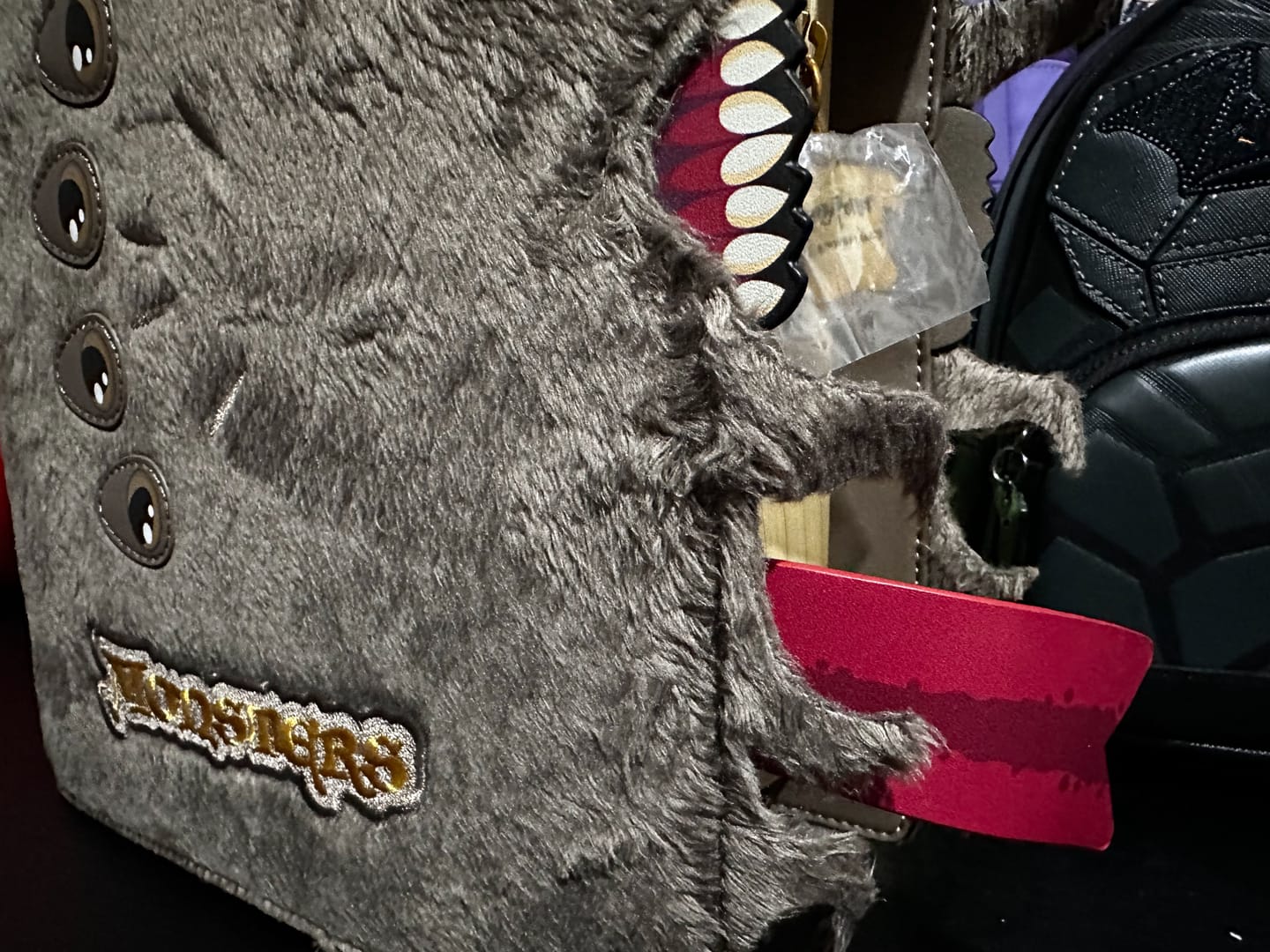 Customer photo review of Loungefly Harry Potter Book of Monsters Book Backpack | Exclusive