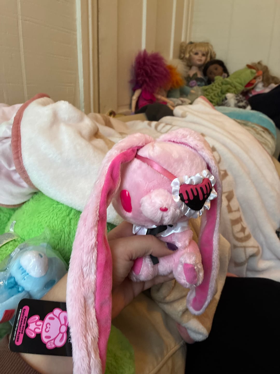 Customer photo review of All Purpose Bunny Eye Patch Palm-Sized Sitting Plush (Pink)