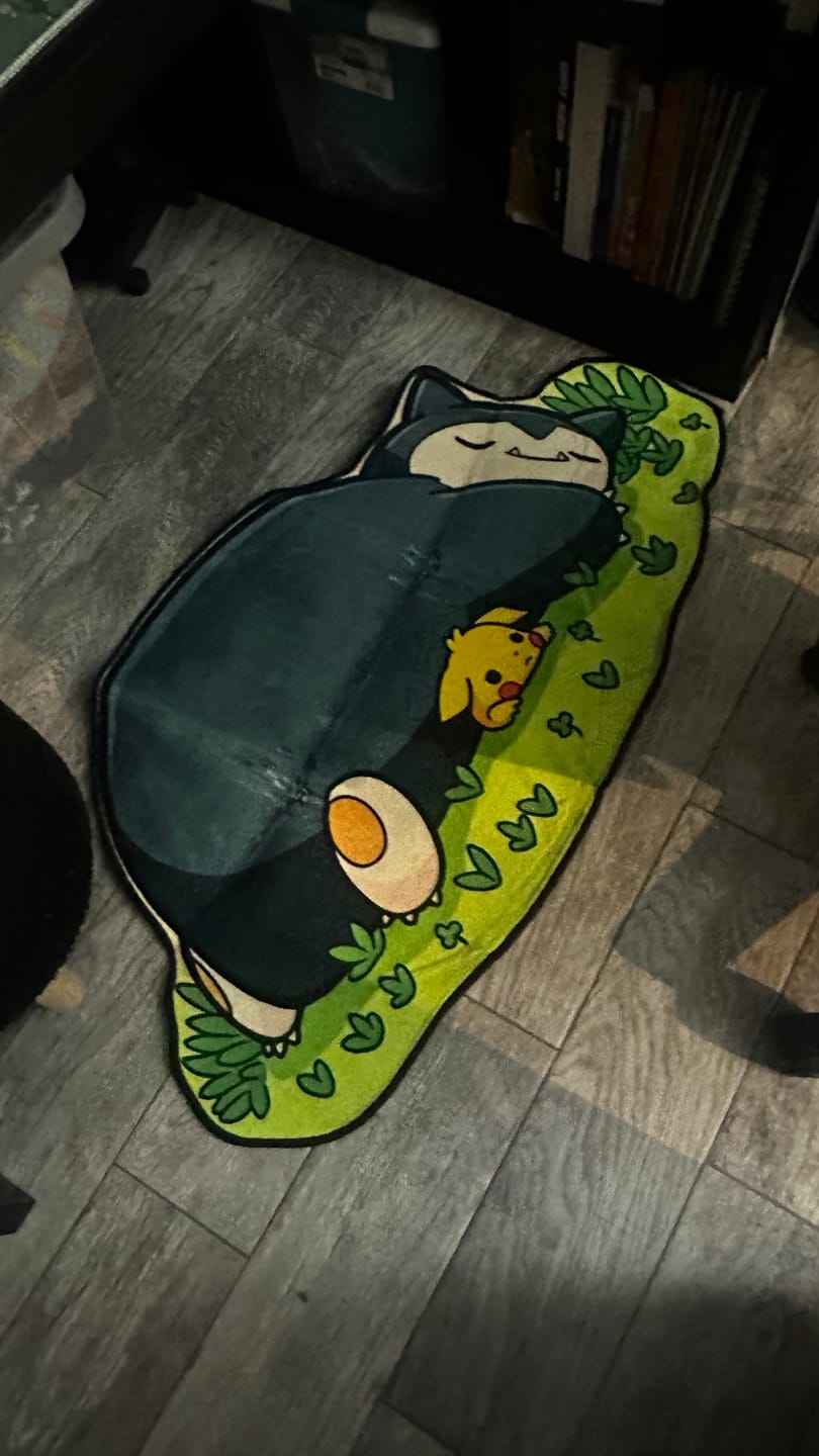 Customer photo review of Snorlax Squashing Pikachu Rug