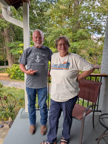 Customer's Lake Ontario Retro Stripe T-Shirts, worn by two people on a porch.