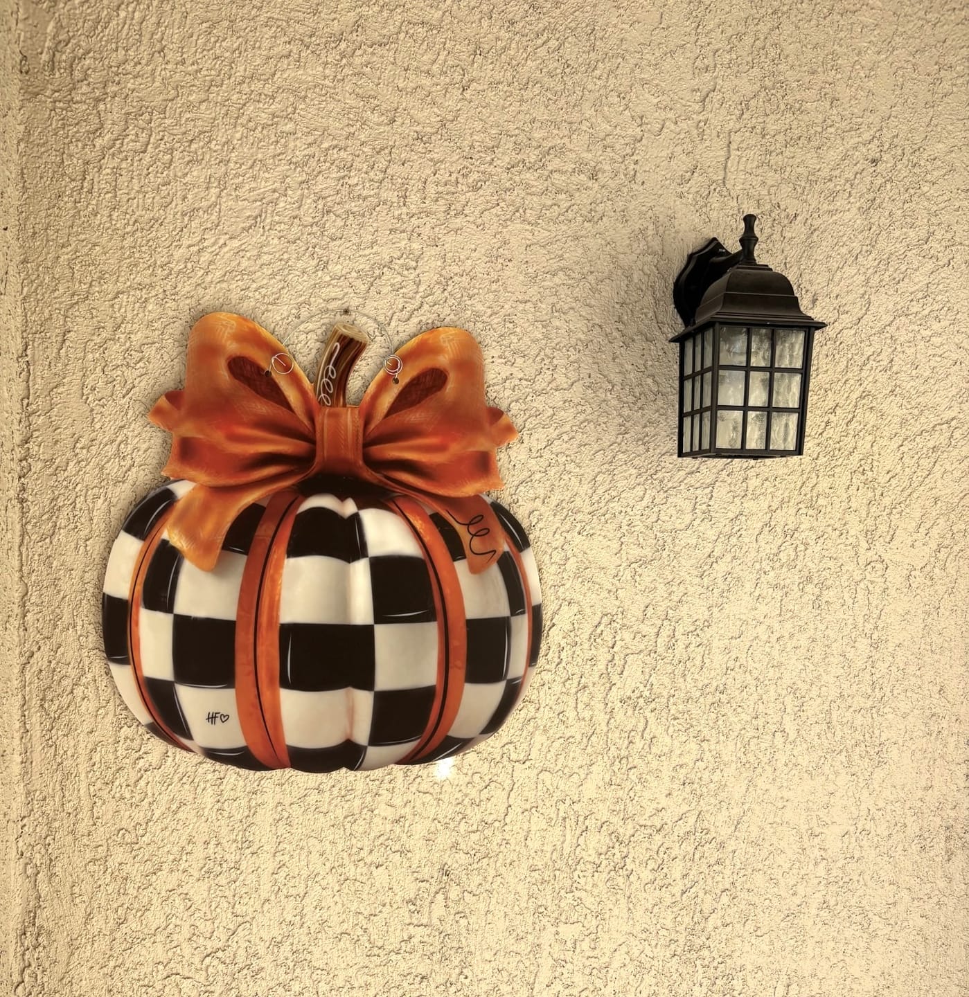 Customer photo review of Elegant Checkered Pumpkin Door Hanger