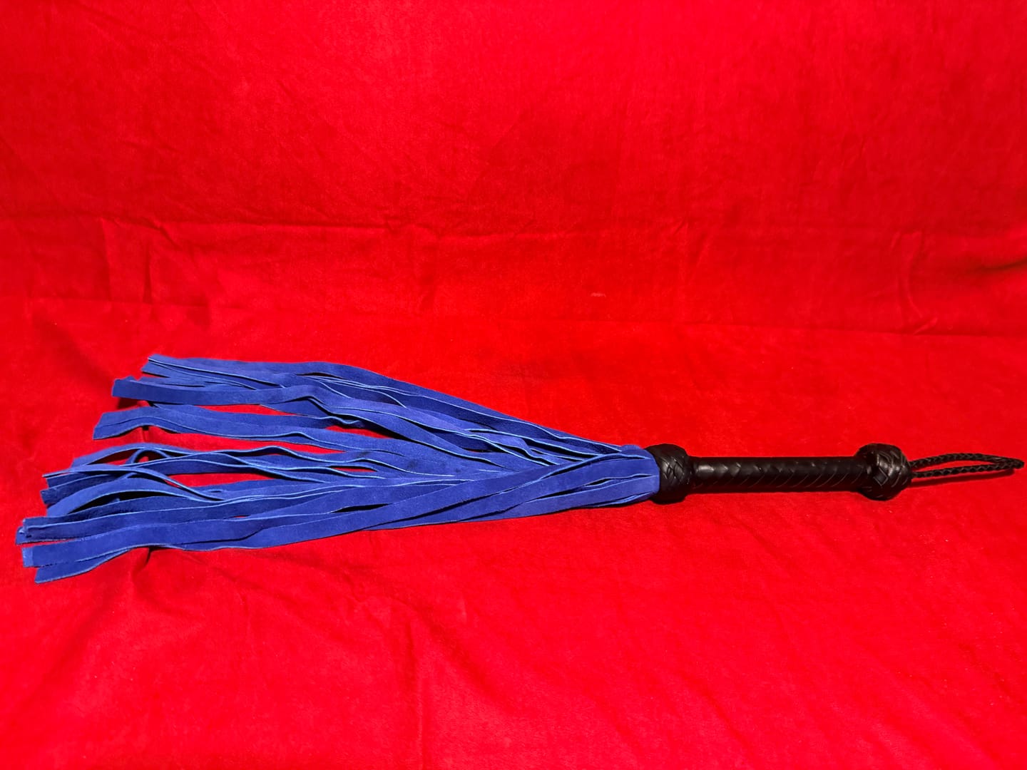 Customer photo review of Real Cowhide Suede Leather Flogger 25 Falls Blue & Black Heavy Duty Thuddy Whip | BDSM Impact Flogger