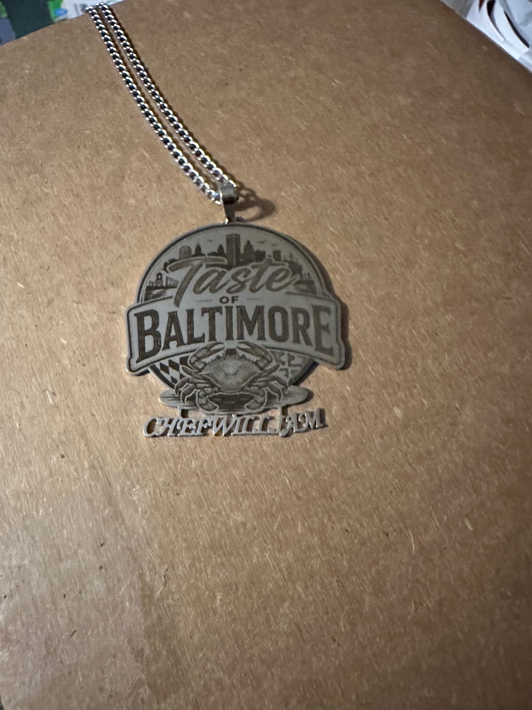 Customer photo review of Custom Logo Engraved Photo Pendant Necklace