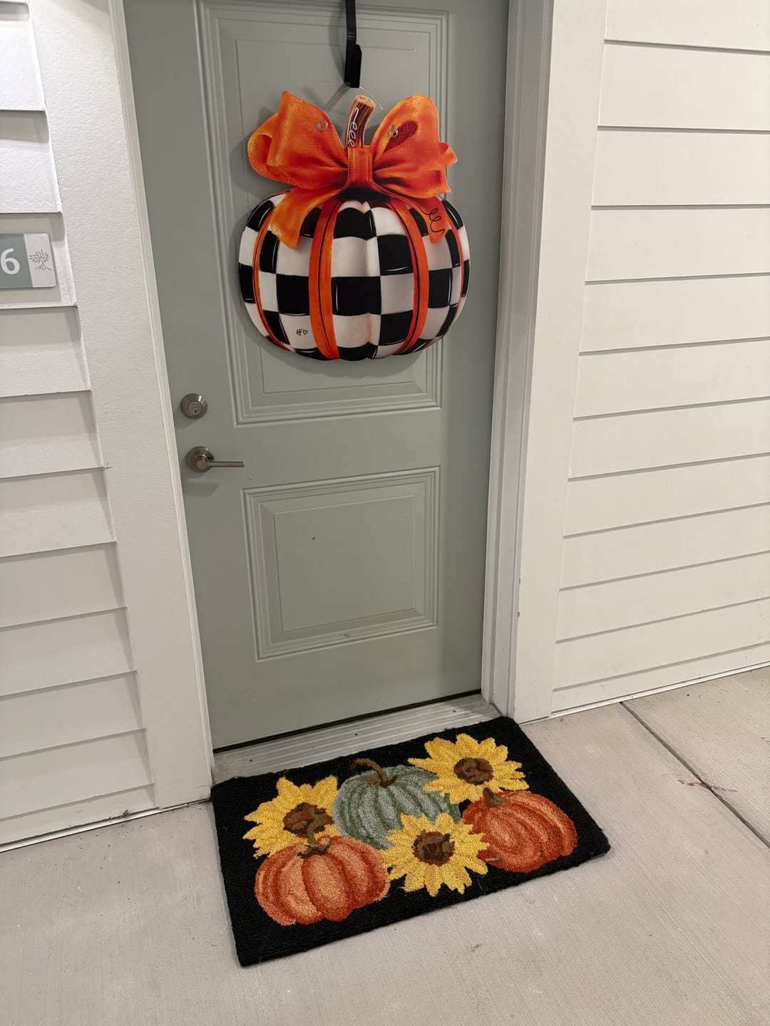 Customer photo review of Elegant Checkered Pumpkin Door Hanger