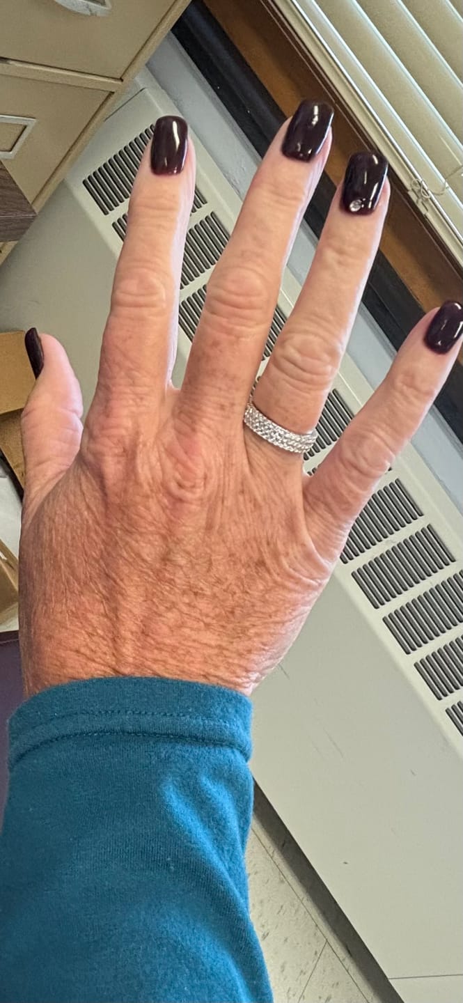 Customer photo review of 5mm Triple Row Moissanite Eternity Ring