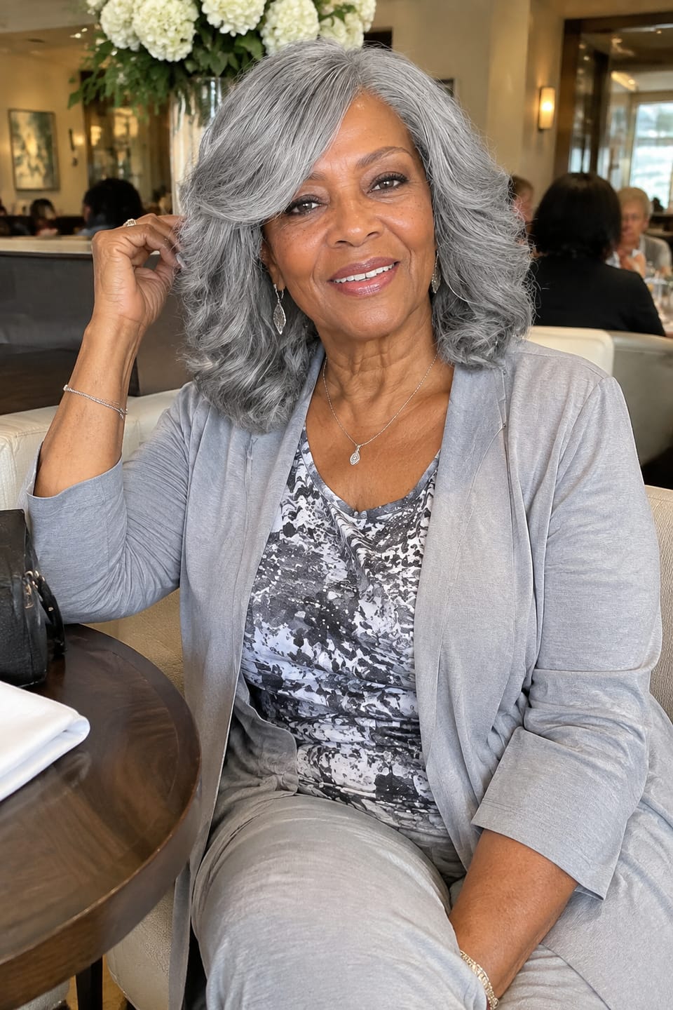 Customer photo review of Luvwin 5x5 Lace Salt & Pepper Side-Part Layered Bob with Natural Waves 100% Human Hair Wig For Mature Women