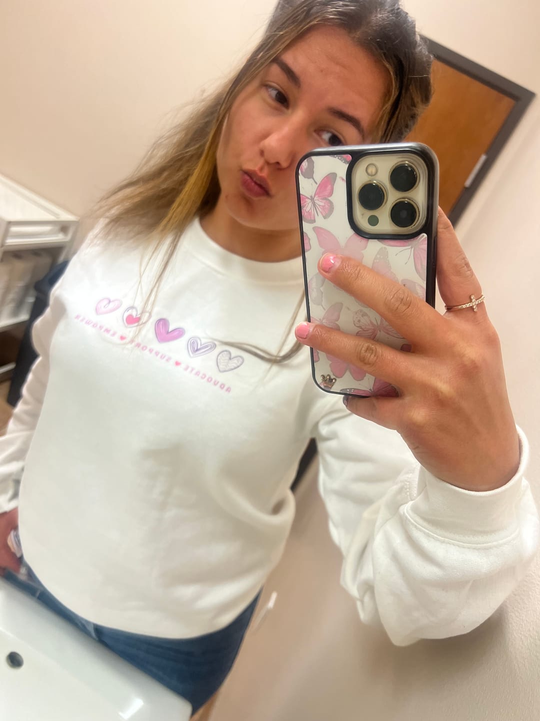 Customer photo review of Advocate Support Empower Love Hearts Sweatshirt