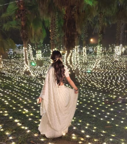 Customer photo review of Astoria Ivory Mirror Work Lehenga Set