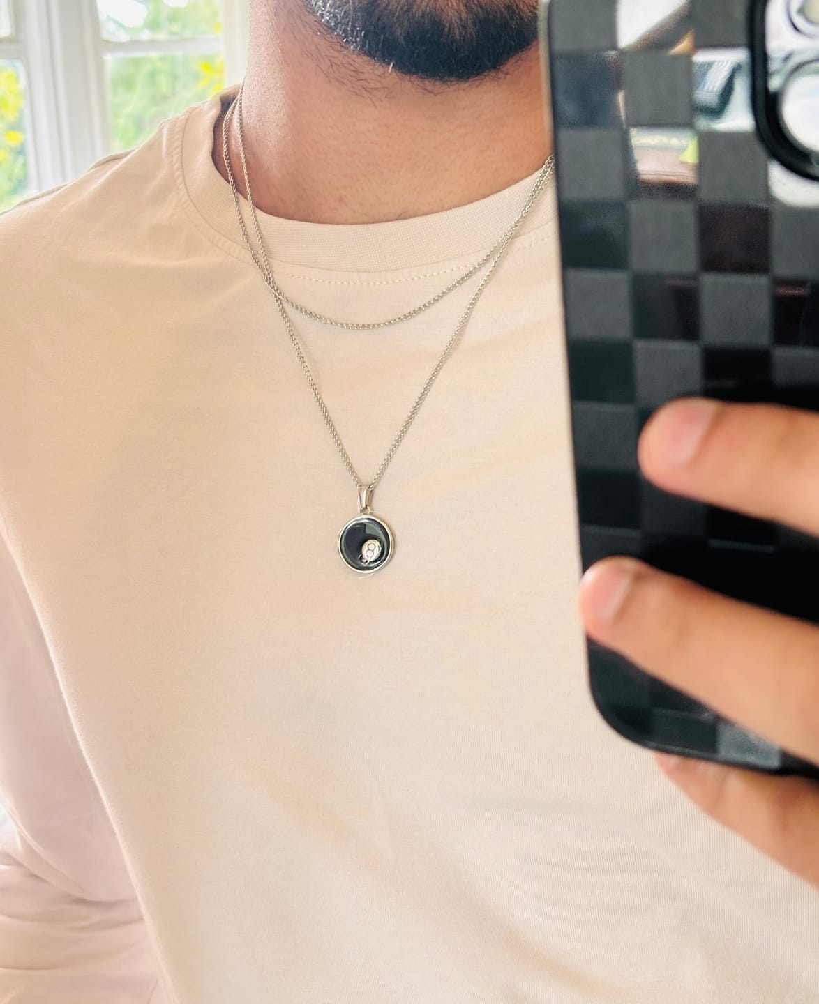 Customer photo review of 8 Ball Pendant