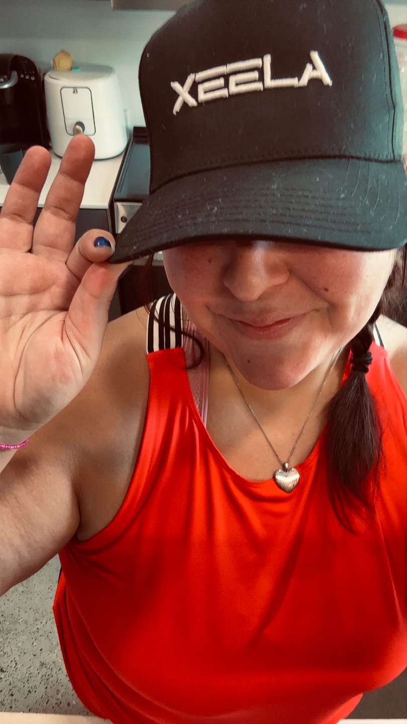 Customer photo review of XEELA PREMIUM ATHLETIC HAT - BLACK W/ WHITE STITCHING