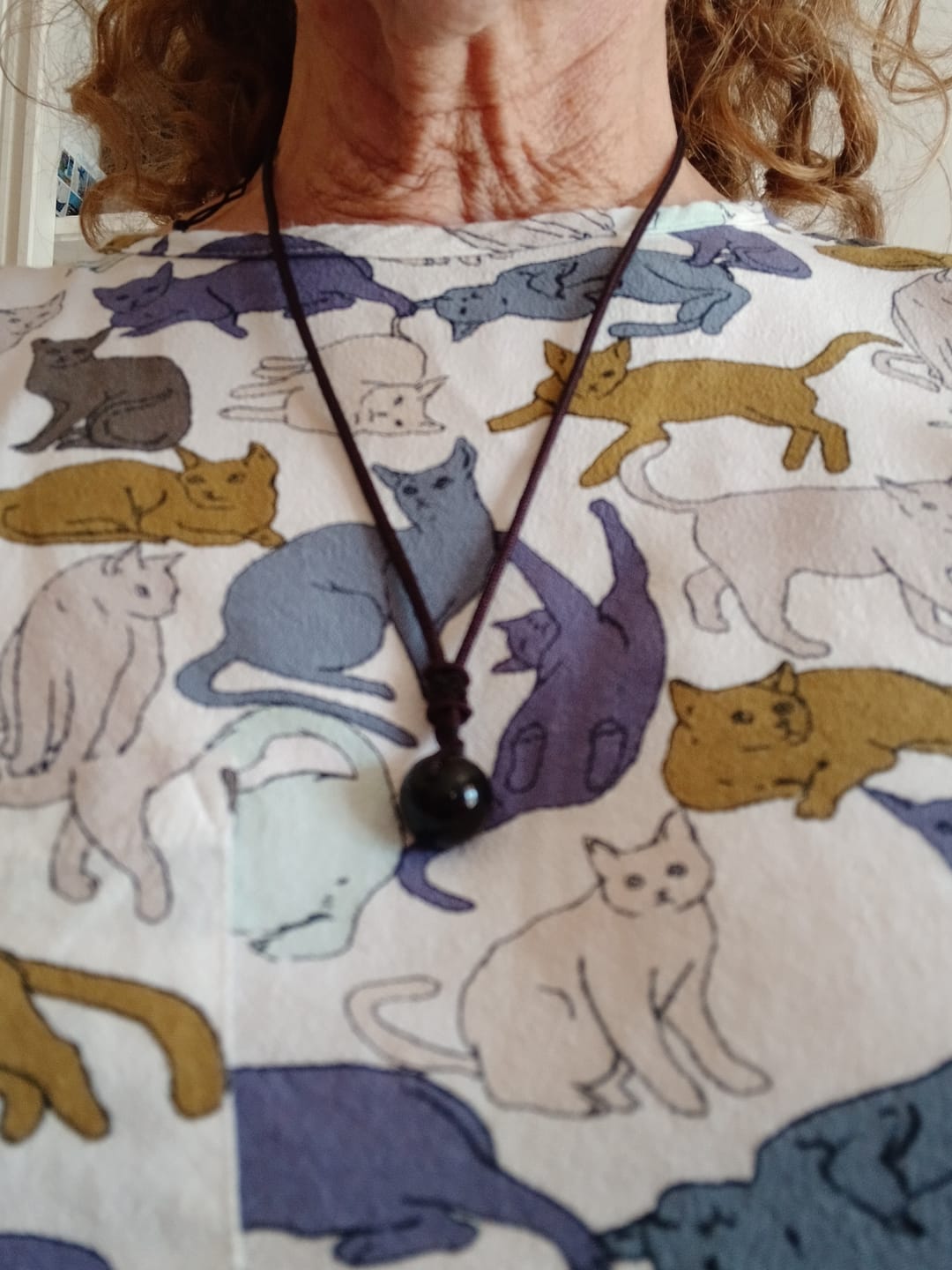 Customer photo review of Pendentif "Sphère" en Obsidienne Dorée