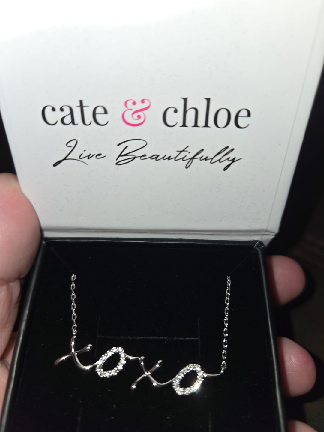 Customer photo review of Jocelyn 18k White Gold Plated XOXO Pendant Necklace with Swarovski Crystals