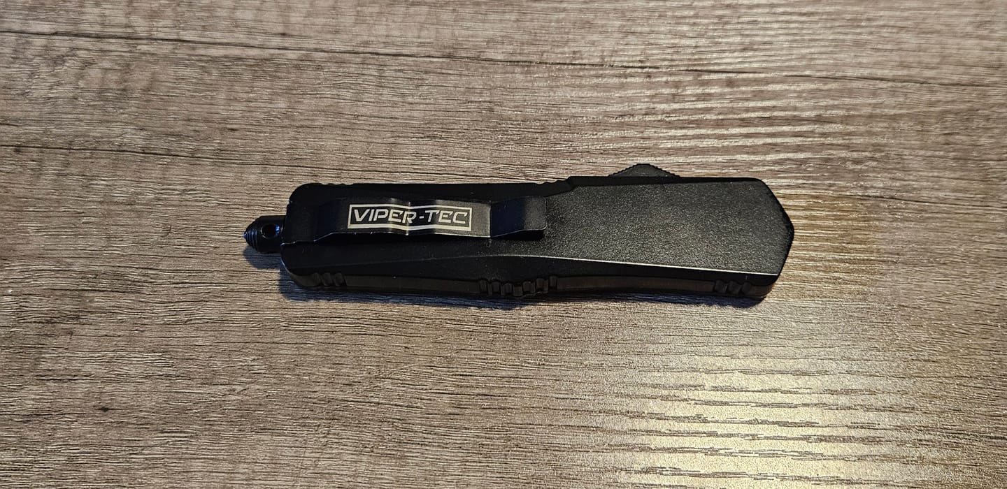 Customer photo review of Black Ghost OTF Knife (Multiple Blade Styles Available)