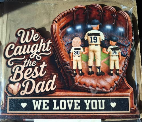 Customer's personalized wooden plaque of a dad and two children in a baseball glove setting.