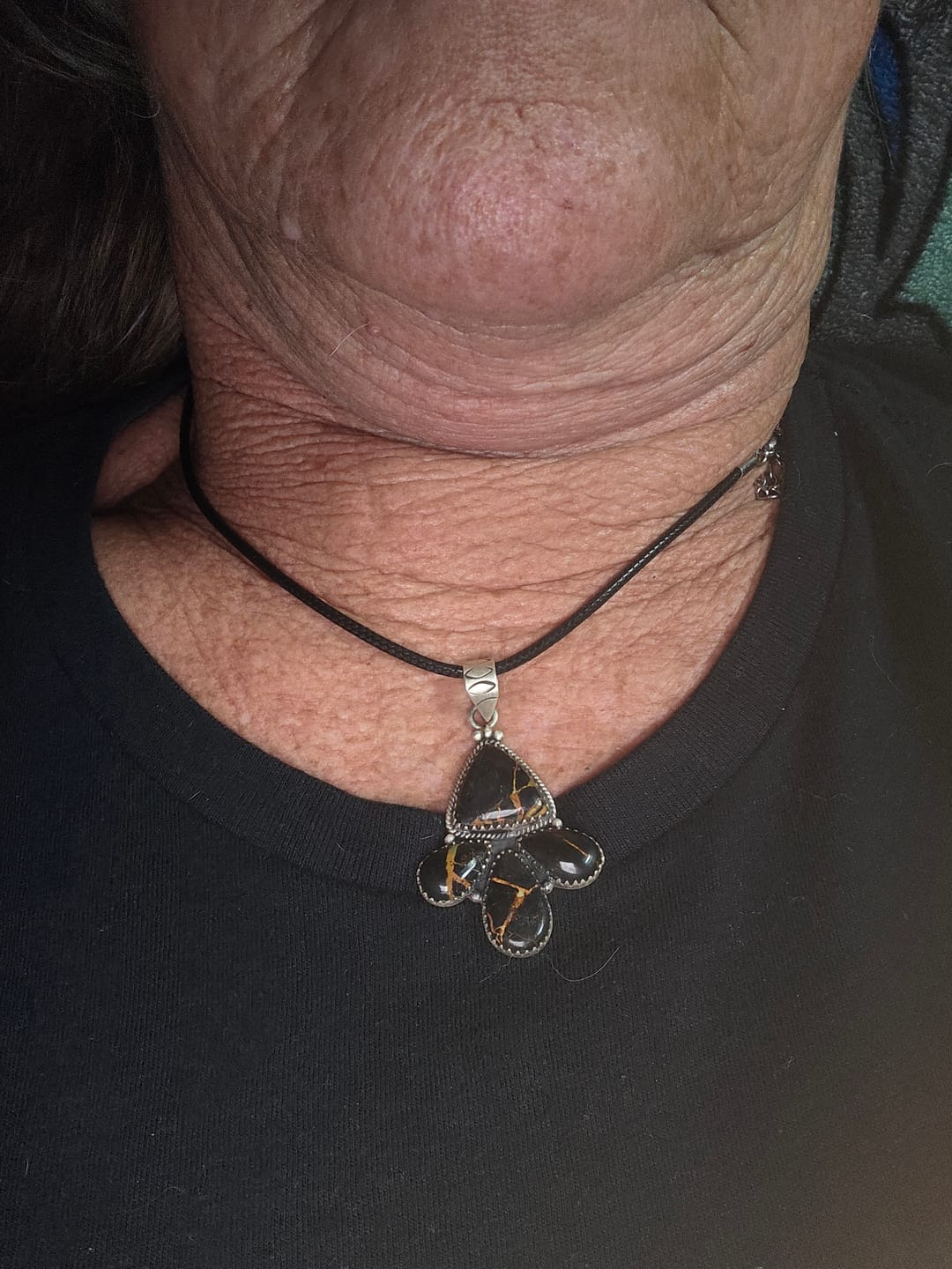 Customer photo review of Southwest Handmade Black Jack Turquoise & Sterling Silver Pendants