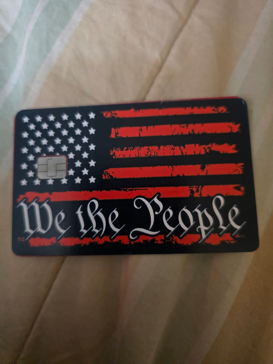 Customer photo review of We The People Flag Credit Card Skin Decal