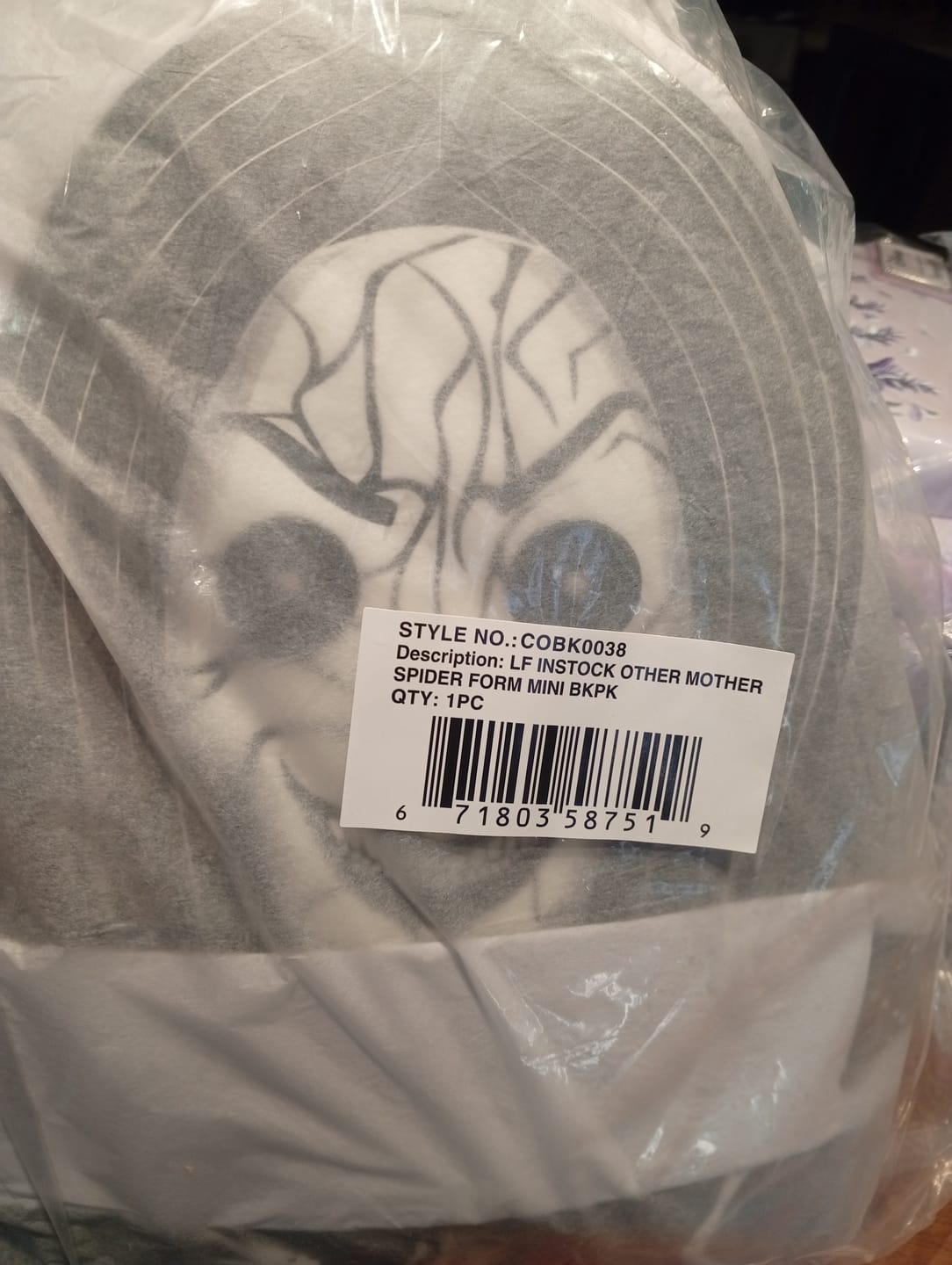 Customer photo review of Loungefly Coraline Other Mother Cosplay Mini Backpack