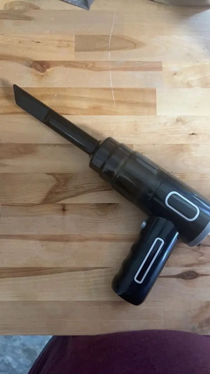 Customer photo review of 3 In 1 Integrated Suction And Blowing Vacuum Combination Vacuum Cleaner USB Charging Small Car Household Vacuum Cleaner