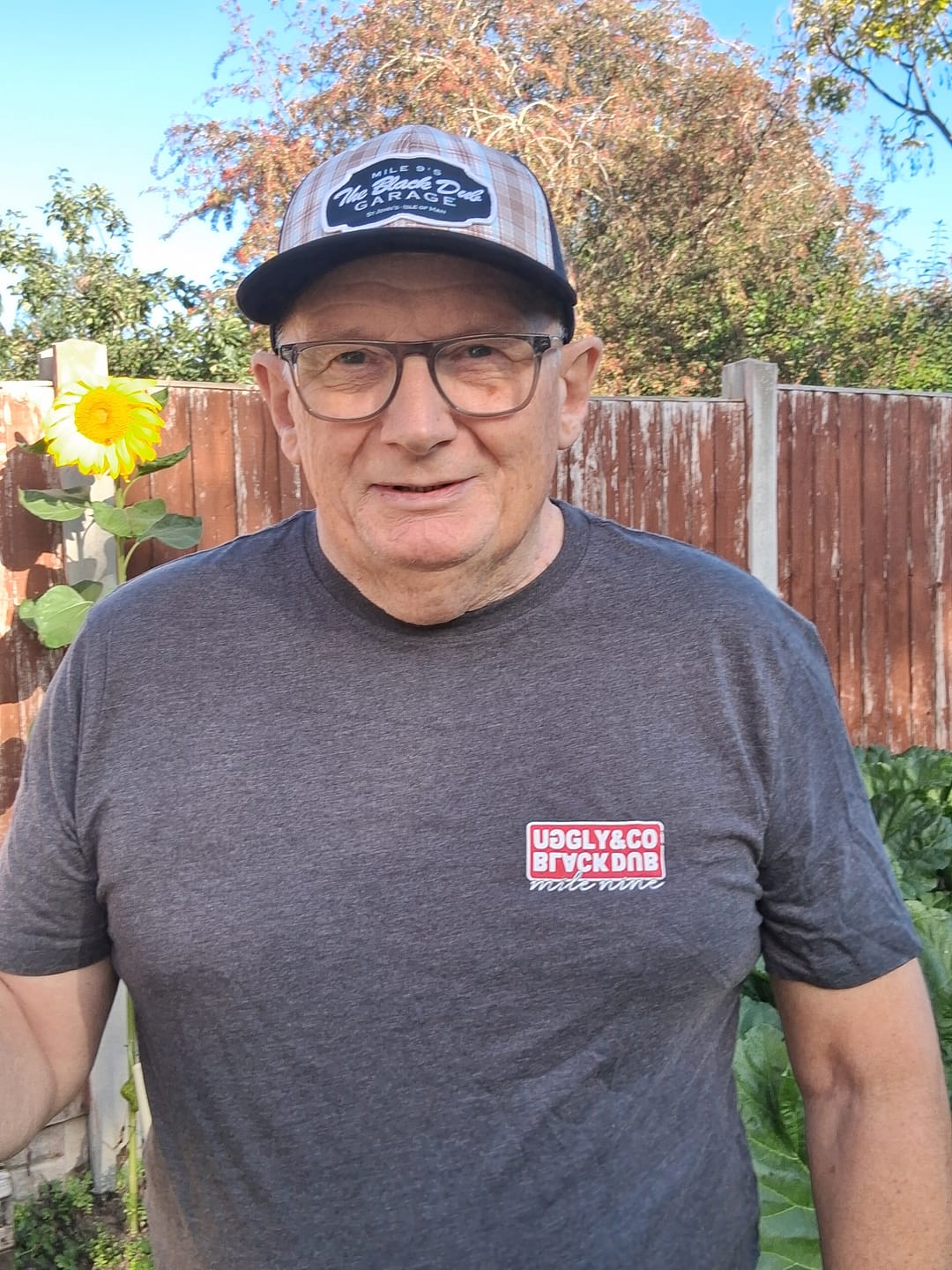 Customer photo review of Tartan Garage Trucker Hat