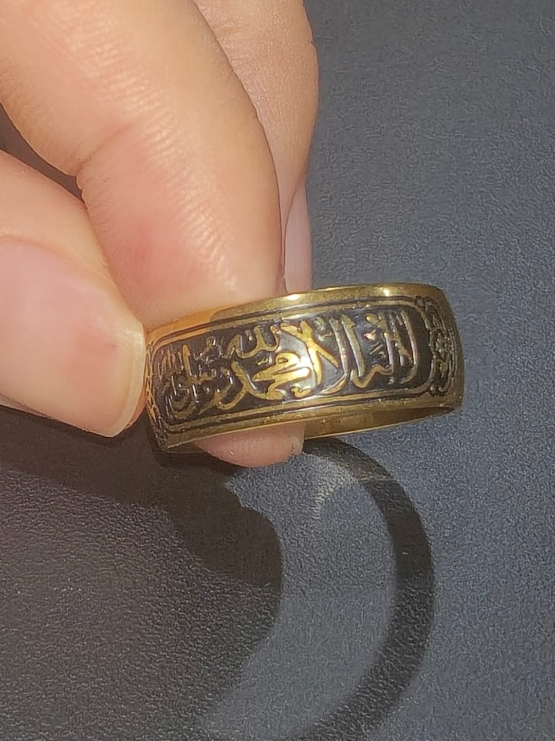 Customer photo review of HilalHaven Perpetual Script Shahada Naskh Calligraphy Band Ring
