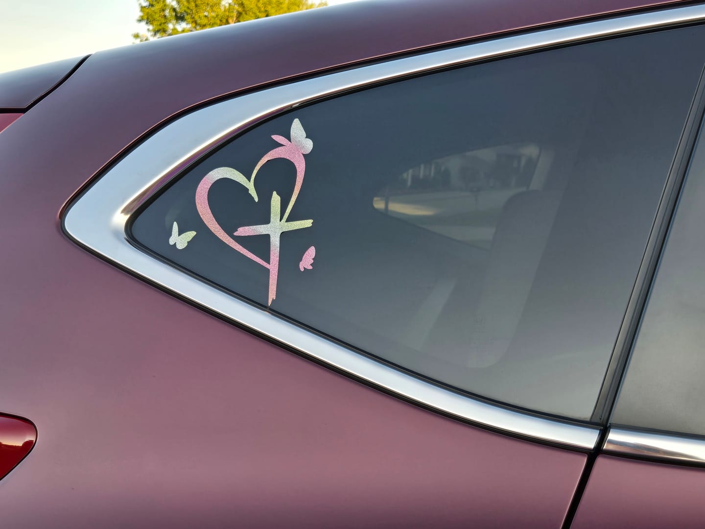 Customer photo review of Christianartworkshop  Glitter Heart Cross Butterfly Silhouette Waterproof Car Window Sticker: A Symbol of Sacred Love
