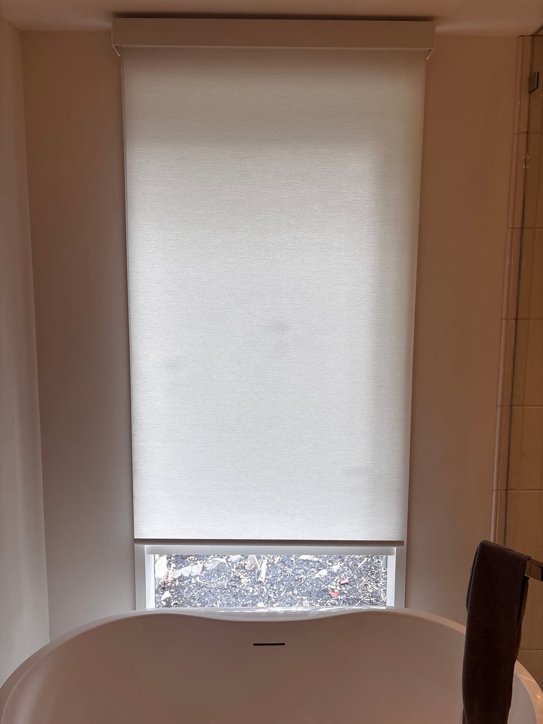 Customer photo review of SmartWings Motorized Light Filtering Roller Shades 70% Blackout Safari